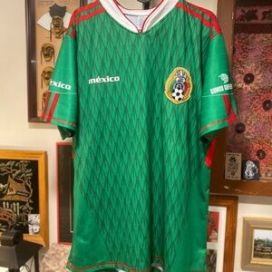 Green Soccer Jersey with Red Accents
